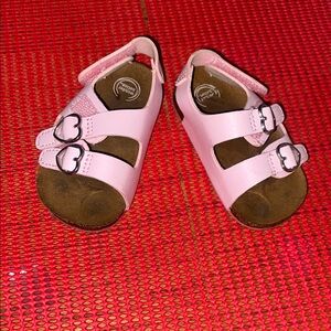 Pink Sandals with Decorative Heart Straps and Rounded Toe
